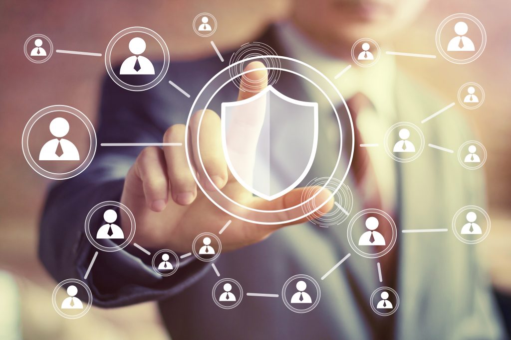 Illustration of a person in suit along with a digital shield