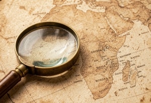 A magnifying glass on a map