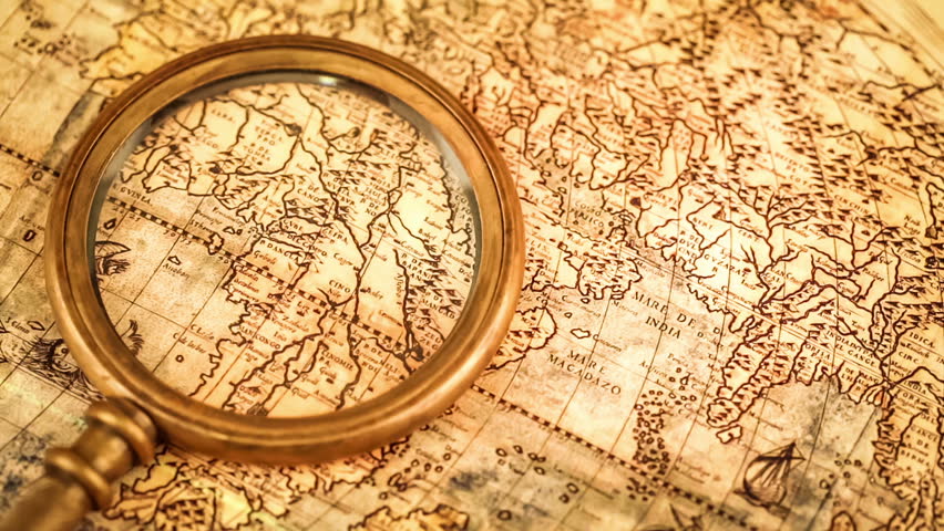 A magnifying glass on a map