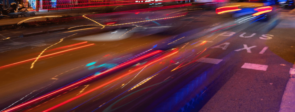 An abstract street image of moving fast, designed to represent the idea of scaling agile/SAFe.