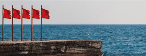 Photo of 5 red flags to represent the post titled 5 Red Flags Deployment Management Is Failing