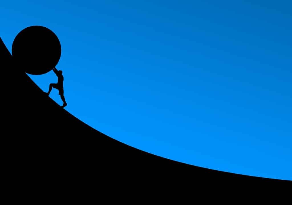 Illustration of a person rolling a ball uphill to represent the post title top test data challenges