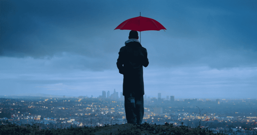 Enov8 Enterprise Configuration Management - person holding a red umbrella